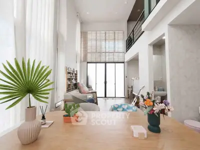 Spacious modern living room with high ceilings and stylish decor
