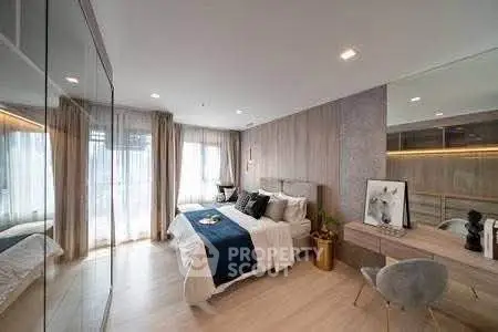 Luxurious modern bedroom with elegant decor and ample natural light