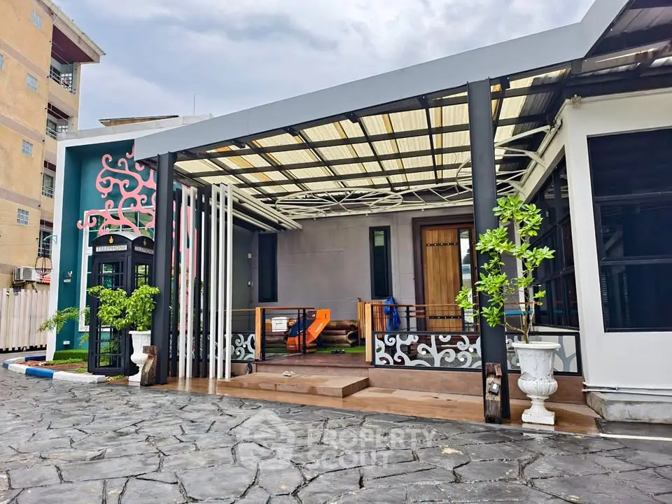 Modern house exterior with stylish patio and unique design elements