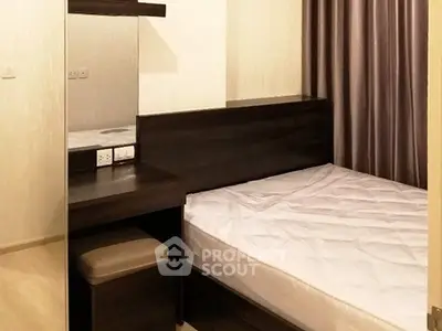 Cozy bedroom with modern furniture and neutral tones, perfect for relaxation and comfort.