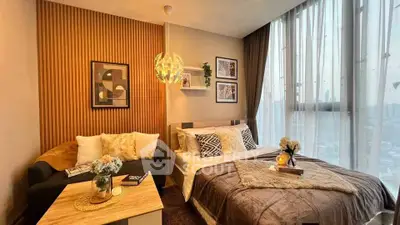 Luxurious bedroom with modern decor and panoramic city view