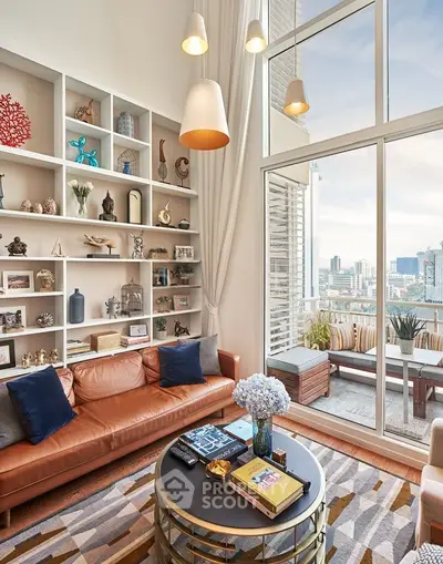 Luxurious living room with high ceilings, elegant decor, and stunning city view from large windows.