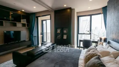 Luxurious modern bedroom with city view, stylish decor, and ample natural light.