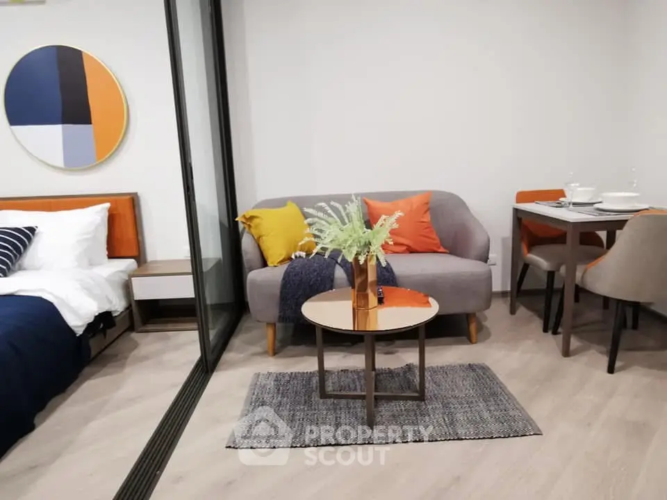 Modern studio apartment with stylish decor and cozy living area