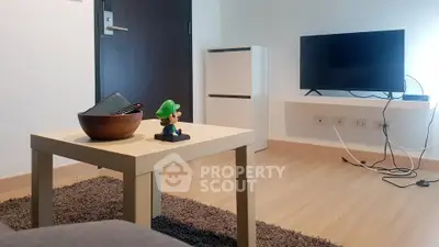 Modern living room with TV and stylish decor