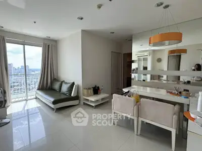 Modern living room with city view, sleek furniture, and elegant decor