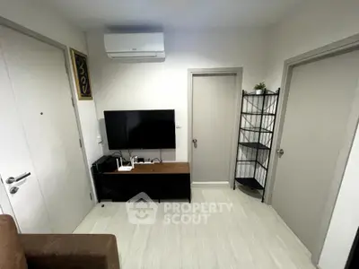 Modern living room with sleek TV setup and minimalist decor