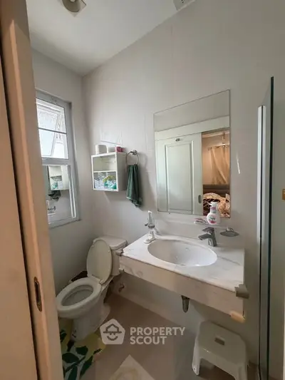 Cozy bathroom with modern fixtures and natural light