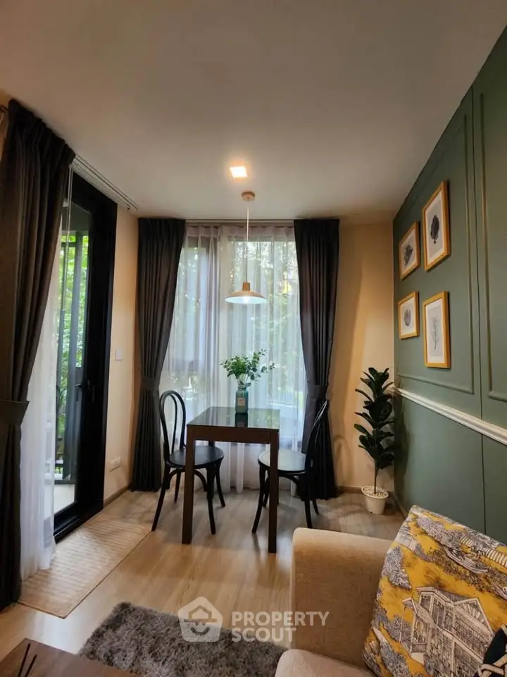 Charming living room with elegant decor and natural light, perfect for relaxation and entertaining.