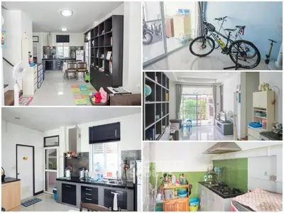 Modern open-layout kitchen and living space with sleek design and natural light.