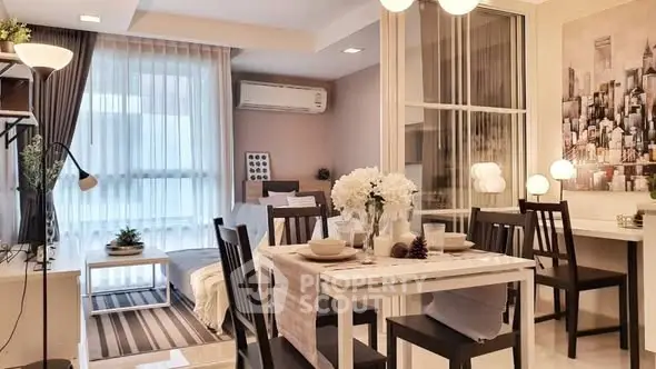 Stylish modern living room with dining area, featuring elegant decor and natural light.