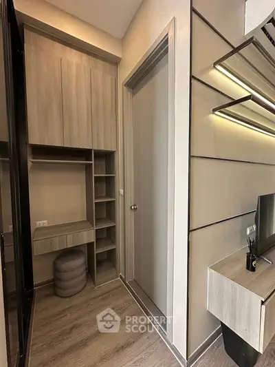 Modern storage area with sleek cabinetry and stylish decor