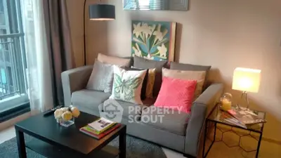 Chic modern living room with stylish decor and cozy seating area.