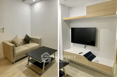 Modern living room with sleek TV setup and cozy sofa, perfect for relaxation.