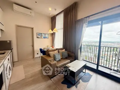 Modern living room with balcony view in high-rise apartment