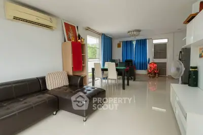 Spacious living room with modern furniture and natural light