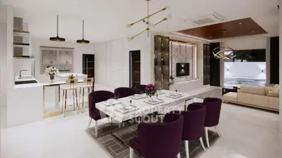 Luxurious open-plan living and dining area with modern decor and elegant lighting