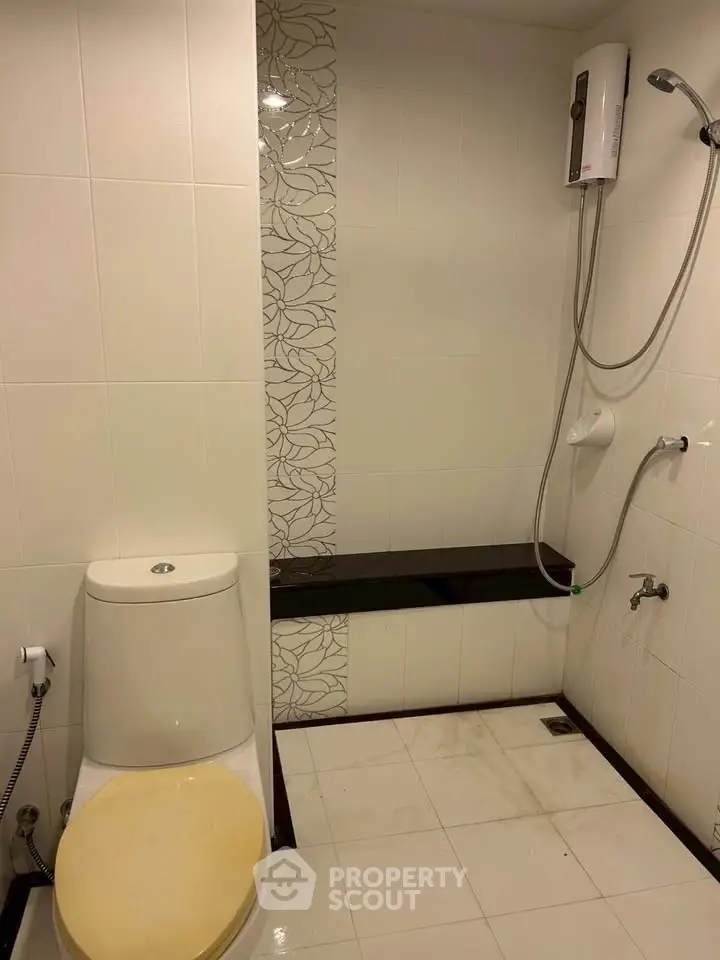 Modern bathroom with shower and toilet in minimalist design