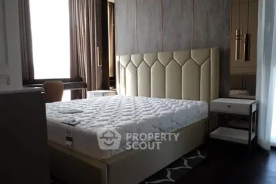 Luxurious bedroom with elegant headboard and modern decor