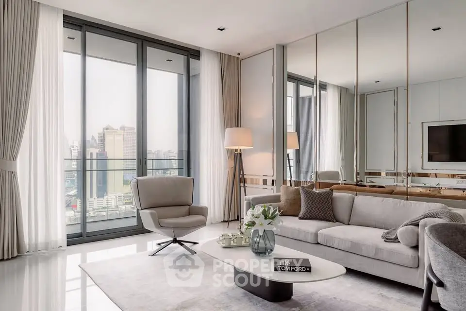 Luxurious modern living room with floor-to-ceiling windows and city view.