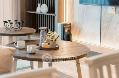 Stylish modern living room with elegant decor and wooden coffee tables.