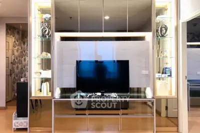 Modern living room with stylish TV unit and elegant decor