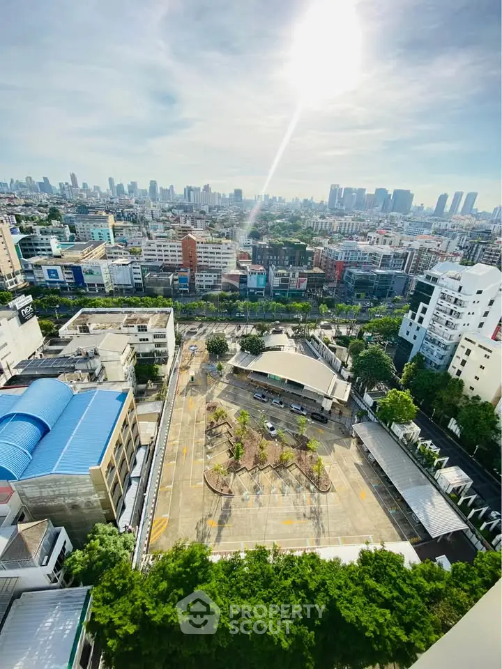 Stunning cityscape view from high-rise building showcasing urban skyline and vibrant city life.