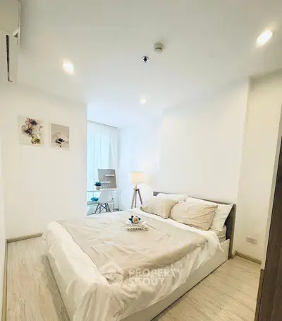 Bright and cozy bedroom with modern decor and natural light