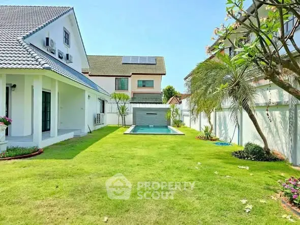 Charming suburban home with lush garden and private pool, perfect for family living.
