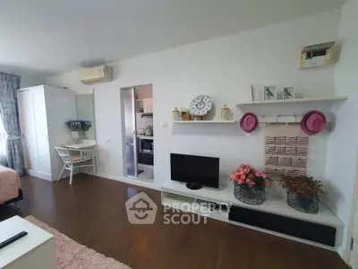 Charming studio apartment with modern decor and cozy ambiance, featuring a stylish open layout and elegant furnishings.