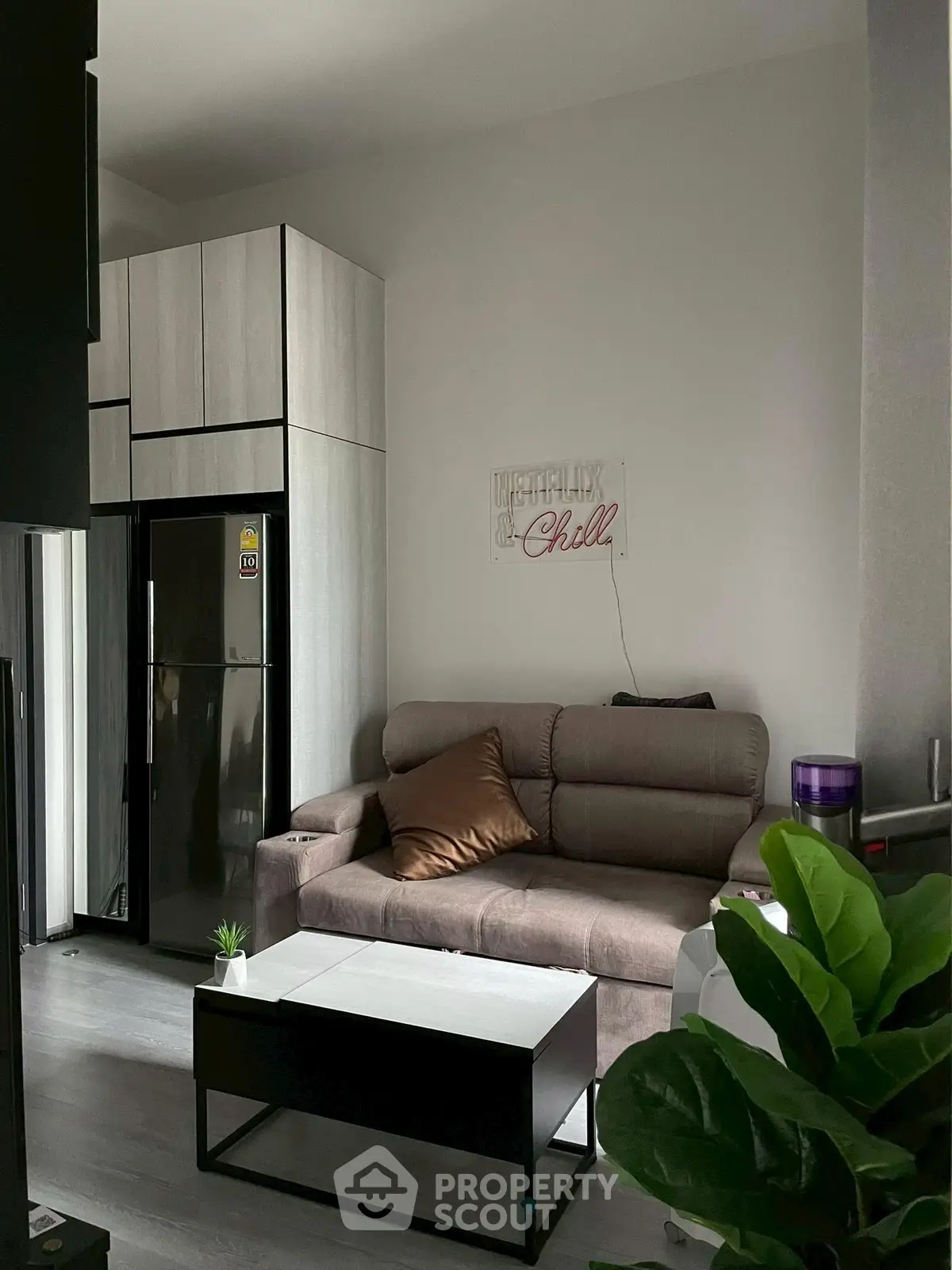 Modern living room with cozy sofa and stylish decor