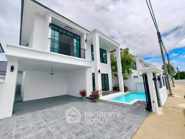 Modern two-story house with pool and spacious driveway