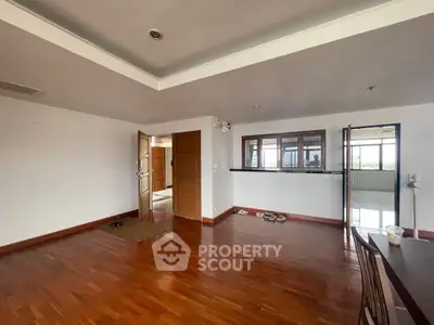 Spacious living room with wooden flooring and open layout