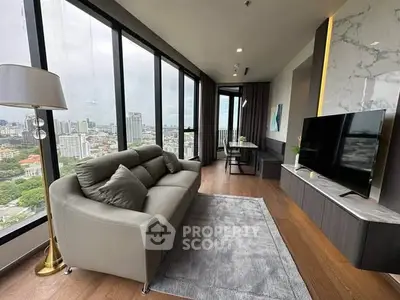 Modern living room with panoramic city view and stylish decor