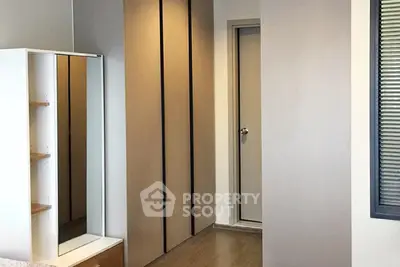 Modern bedroom with sleek wardrobe and minimalist design
