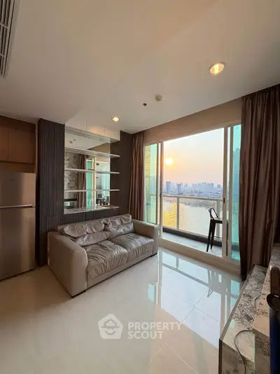 Modern living room with stunning city view and balcony access in high-rise apartment