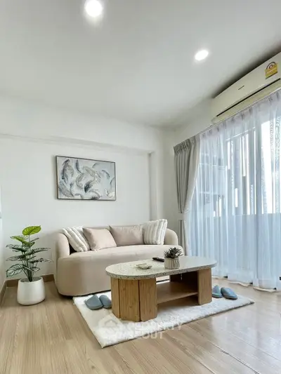 Bright and cozy living room with modern decor and natural light