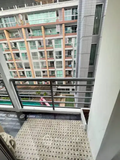 Modern balcony with city view in contemporary apartment building