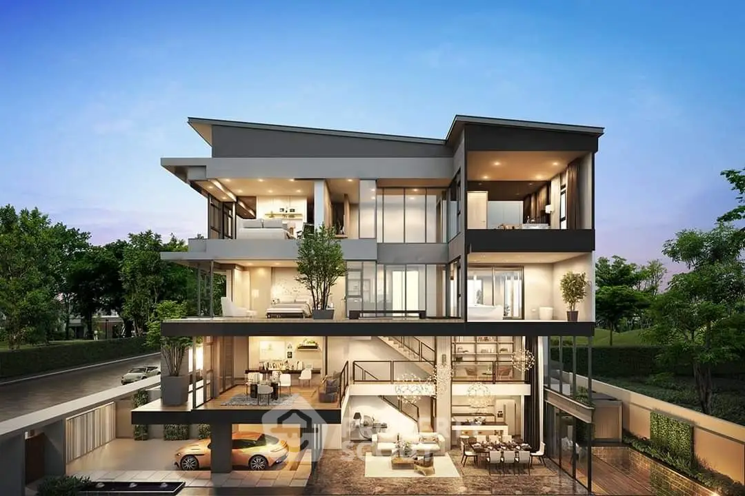 Luxurious modern multi-level home with expansive glass windows and elegant design.