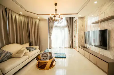 Luxurious living room with elegant chandelier and modern decor