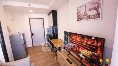 Modern living room with stylish decor and open kitchen layout