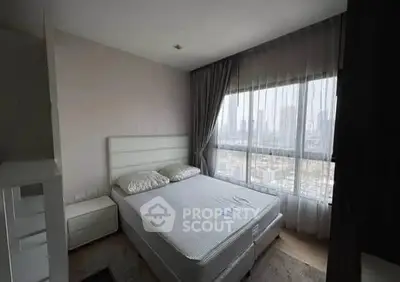 Modern bedroom with city view and stylish decor