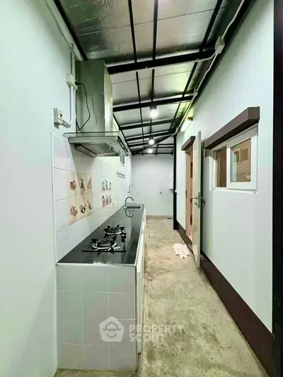 Modern kitchen with sleek gas stove and minimalist design