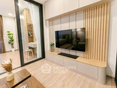 Modern living room with sleek TV unit and stylish decor