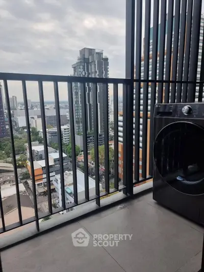 Modern balcony with city view and washing machine, perfect for urban living.