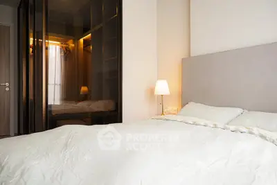 Cozy bedroom with modern design and elegant lighting