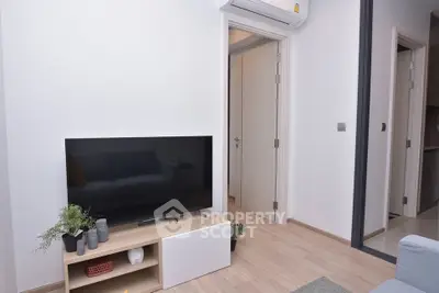 Modern living room with sleek TV setup and minimalist decor