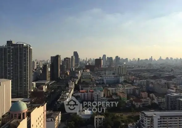 Stunning cityscape view from high-rise building showcasing urban skyline and architecture.