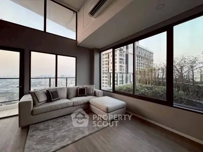 Luxurious living room with panoramic city view and modern decor