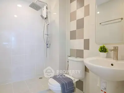 Modern bathroom with sleek shower and stylish tile design